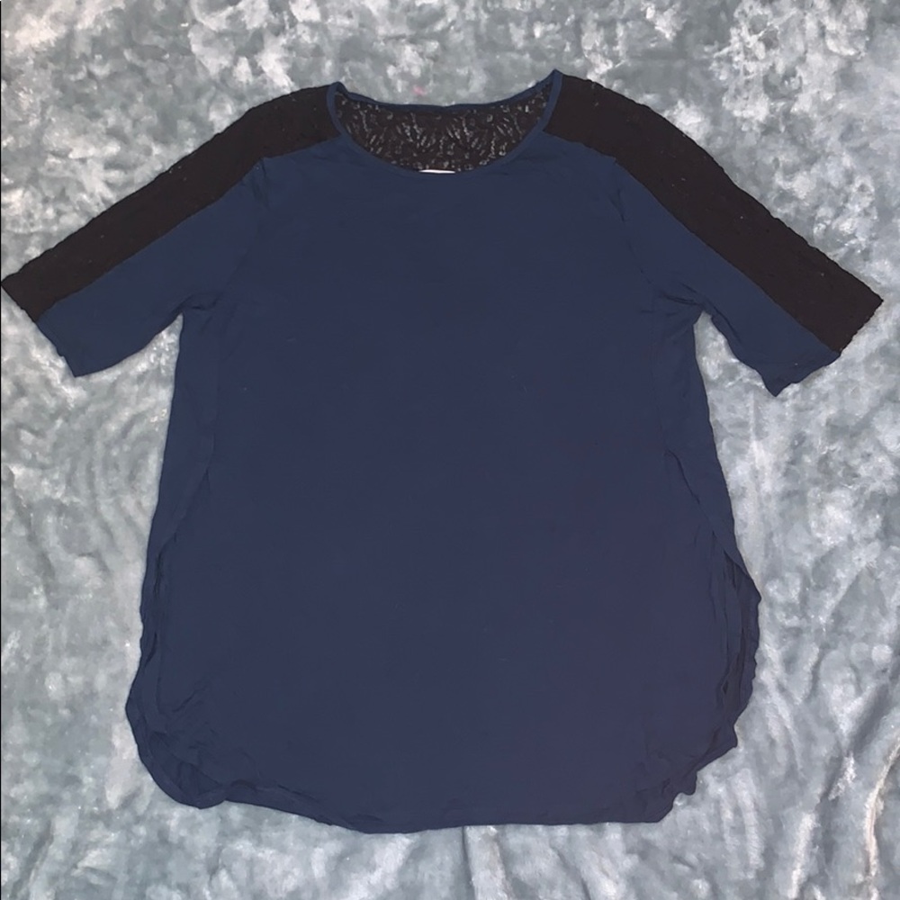 Turquoise blouse with side cuts